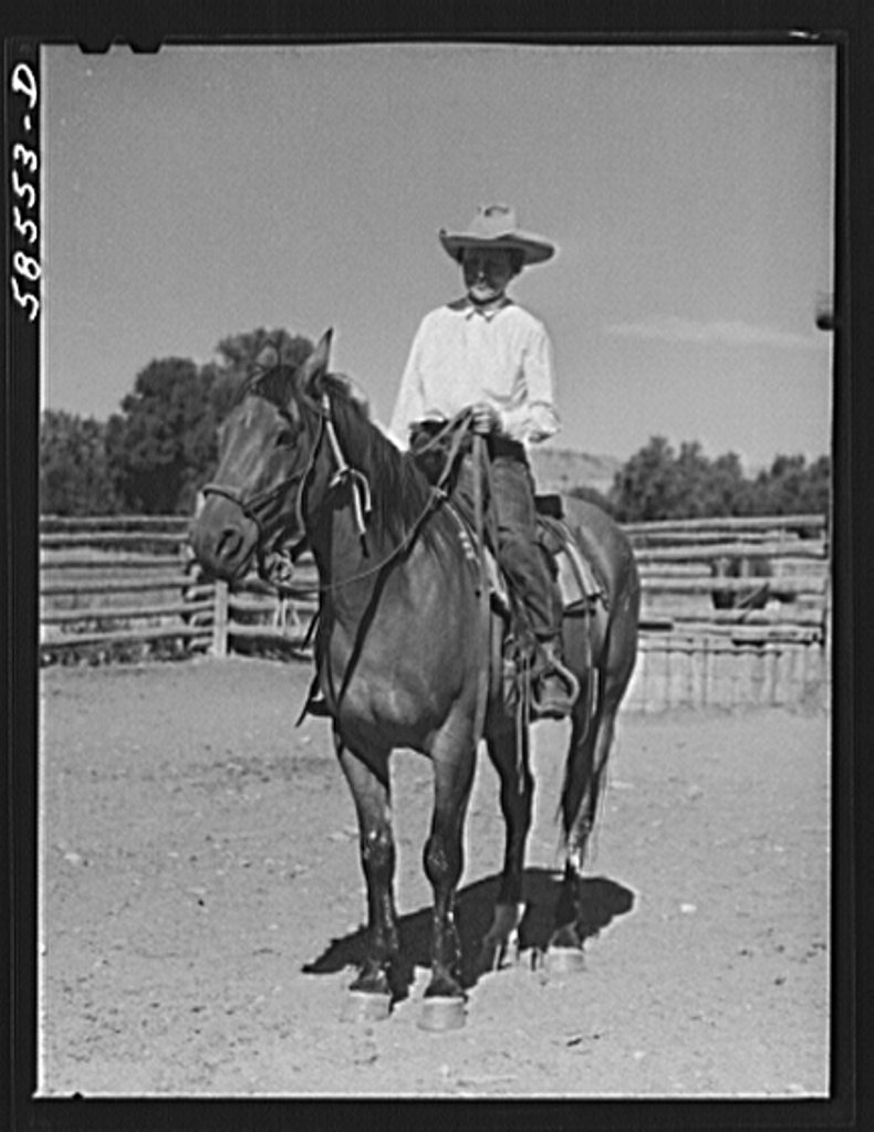 Marion Post Wolcott: Mrs. Lyman Brewster on one of their ranch horses in the corral. Quarter Circle U, Brewster-Arnold Ranch Company. Birney, Montana